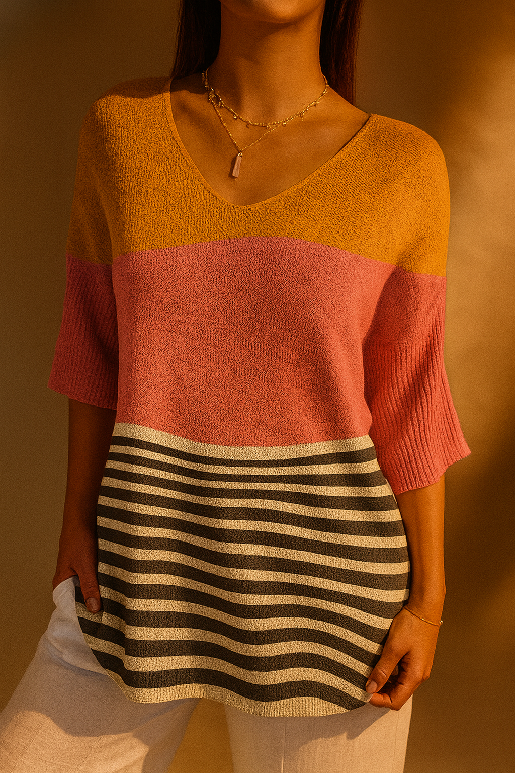 Damski sweter dzianinowy w abstrakcyjne wzory w linie