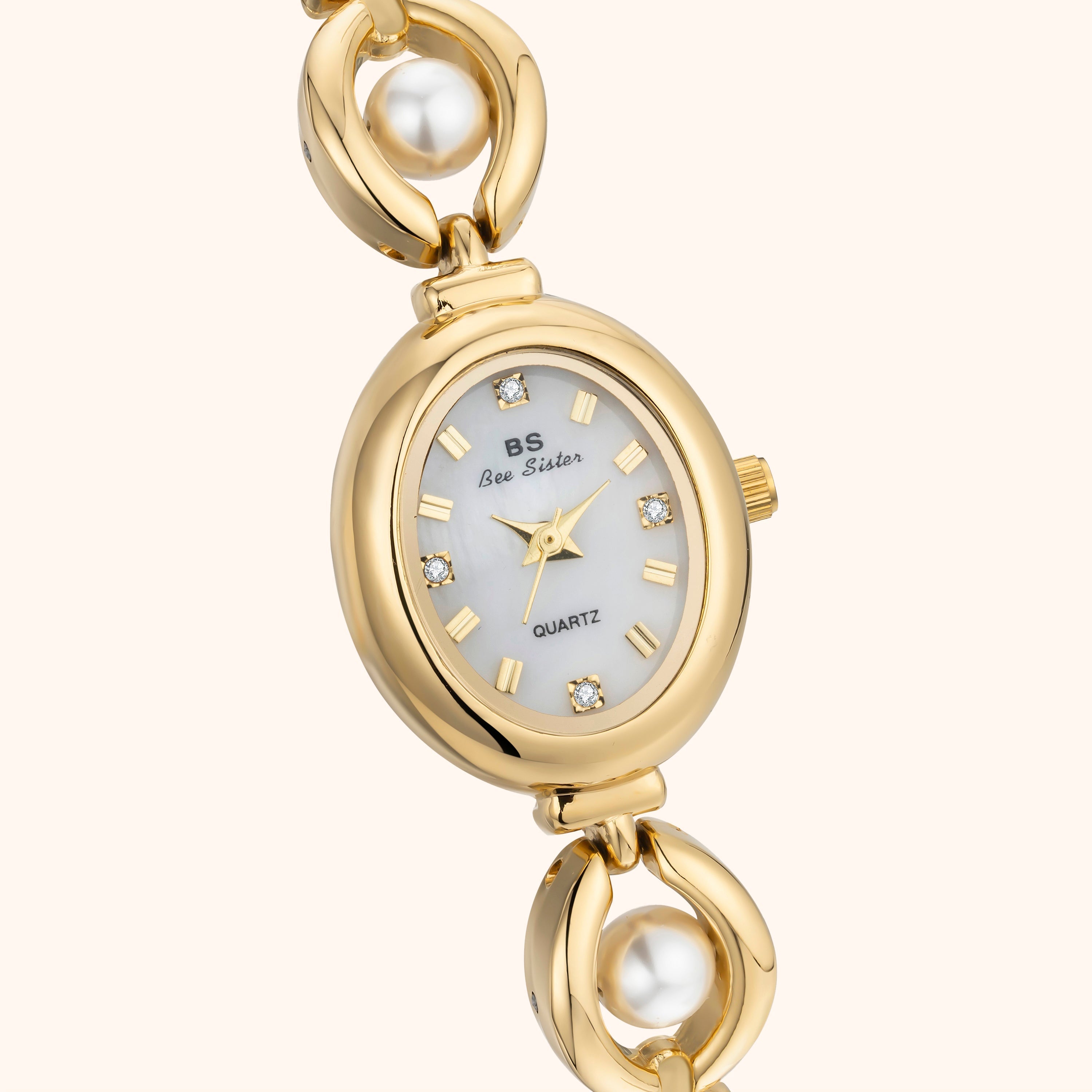 Zegarek damski złoty – elegancki design z perłowo-białą tarczą